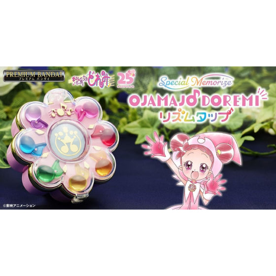 Product image for a toy from the anime 'Ojamajo DoReMi', featuring a colorful transformation device with light and sound effects, alongside an illustration of the character Doremi.